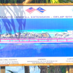 A sign announcing the new landfill location ocean side between the MEC tank farm and the bridge went up in August. Photo: Karen Earnshaw.