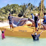The new WAMCat was launched earlier this week in Majuro. It was built as part of a RMI National Energy Office-supported program that involves outer islands boat builders in building vessels designed for their home islands. This one will make its way to Wotje Atoll. Photo: WAM program.
