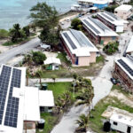 Grid-connected solar panels adorn the roofs of classroom buildings at Marshall Islands High School as part of a World Bank-funded project to improve Majuro’s energy system. Photo: MEC.