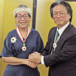 Retired Ambassador Amatlain Kabua with Japan Ambassador Soma Hirohisa at the conferral ceremony at Marshall Islands Resort. Photo: Hilary Hosia.