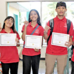 The Majuro Cooperative School debate team, with teacher Julie Lorenzen Schnoor, after winning first place in the Education Week debate. Photo: Wilmer Joel.