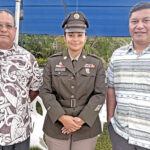 US military veterans Baron Bigler, left, and RMI Foreign Minister Kalani Kaneko, right, joined for a photo with and Army Staff Sgt. Renee Cabral during the ANZAC Day event April 25 in Majuro. Photo: Karen Earnshaw