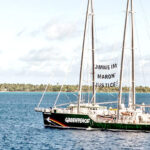 The Rainbow Warrior anchored off Mejatto Island, Kwajalein Atoll in late March. It traveled to Mejatto to mark the 40th anniversary of the Rongelap relocation to Mejatto.