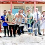 VIPs break ground for a new basketball court that will be built for the Deaf Education Center. The Church of Jesus Christ of Latter Day Saints is funding the project. Photo: Wilmer Joel.