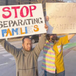 Marshall Islands advocate Albious Latior, left, and friends in Springdale, Arkansas protest deportations of Marshallese that are breaking up families in the area.