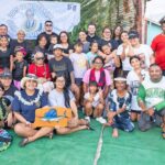 Family icon Joe deBrum, middle in red shirt, surrounded by family members at the weigh-in for the sailfish tournament April 12.