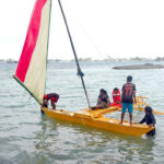 Trainees head away from WAM to learn the basics of sailing a korker, one of the smaller styles of traditional canoes.