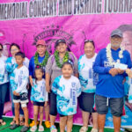 Captain Ronnie Reimers, third from right, receives the winning check from Lazarus Andrike fishing tournament sponsor Salome Domnick at the end of last Saturday’s Marshalls Billfish Club’s tournament. Photo: Karen Earnshaw.
