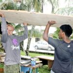Marshallese high school students are getting experience working in carpentry and auto mechanic classes. Photo: Raijin Leban.