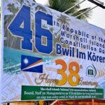 The main road-facing billboard in front to the NTA headquarters in Majuro recently promoted awareness of the country’s 46th Constitution Day celebration. Photo: Hilary Hosia.