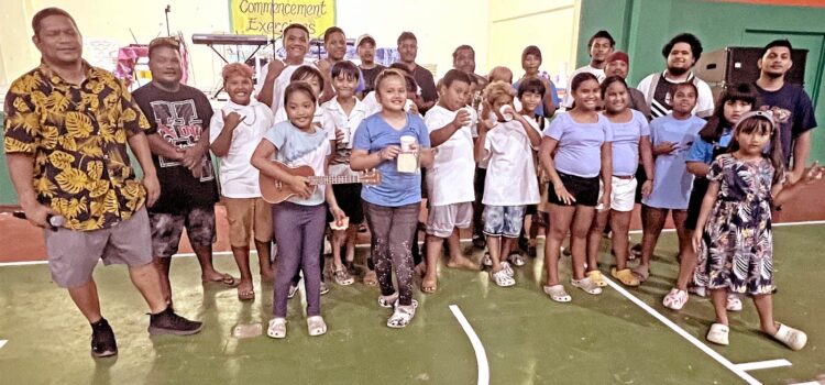The smiles and enthusiasm of the youthful participants in the AMI Band’s summer music camp shows how much they enjoyed the camp and the performance at MIHS gym last weekend. Photo: Giff Johnson. AIMing high for summer fun