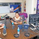 Deputy Secretary of State Christopher Landau, left, joined with Admiral Samuel Paparo for an interview at Power 103.5FM with reporter Leilani Macquinn. Photo: Chewy Lin.
