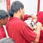 Marshalls Christian High School students at Rongrong Island learn to treat water with Clorox to eliminate pollution problems.