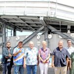 VIPs, including European Union Ambassador Barbara Plinkert, third from left, and Natural Resources and Commerce Minister Tony Muller, fourth from left, joined together for the celebration of the recently arrived tuna loader that is expected to greatly improved onshore unloading of tuna for the purse seine industry. Photo: Eve Burns.
