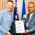 RMI Environment Minister Bremity Lakjohn and Australia Climate Change Minister Chris Bowen signed the RMI-Australia Renewable Energy Partnership memorandum of understanding at COP30 in Brazil earlier this month. Photo: Chewy Lin.