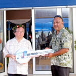 Japan Ambassador Hirohisa Soma, left, hands over the ceremonial key to the new Sea Patrol building to Justice Minister Wisely Zackhras. Photo: Rubon JR. Jacklick.