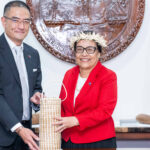 President Hilda Heine presents new Taiwan Ambassador Hsu Wei-ming with a handicraft gift following the presentation of his diplomat credentials December 1 in Majuro. Photo: Chewy Lin.