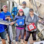 The Kirtake team shows off some of its catch at the Catch-5 tournament weigh in last Saturday. Team Captain, Ronnie Reimers, is standing at back, right. Photo: Phil Welch.