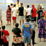 Hundreds of citizens lined up at the ECC gym at the end of November last year to collect their first quarterly Enra (universal basic income) payment. Photo: Rubon JR Jacklick.