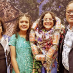 Kathy Jetñil-Kijiner graduated earlier this month with her PhD from the Australian National University. Celebrating with her, from left: Mother and President Hilda Heine, daughter Peinam, Kathy and Tommy Kijiner, Jr.