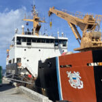 The new aids to navigation buoy next to the US Coast Guard vessel Juniper. During its visit to Majuro, the buoy was installed at the main pass by Kalalin Island. Photo: Office of National Security.