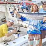 A very happy Wildside team show off their catch at the weigh-in last Saturday. From left: John Phillips, Steve Sharp and Brian Kirk. Photo: Amy Streeb.