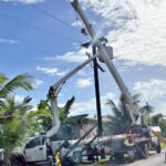 Replacing a power pole in the Rairok area of Majuro was one element of a planned all-day power outage during late February. Photo: Giff Johnson.