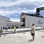 The Taiwan delegation visited the Kramer Dock during their visit last week. Dock fisheries crew showed off their tuna off-loading equipment, demonstrating how the Mark-2 tuna loader works to load fish from a purse seiner into a freezer container. Photo: Giff Johnson.