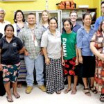 Dr. Holden Nena (front, fourth from left) with Public School System and Ministry of Health and Human Services collaborators. Photo: Giff Johnson.